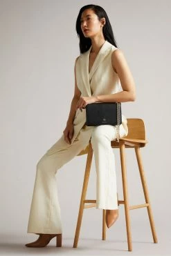 Ted Baker Black Jorjey Flower Eyelet Cross Body Bag 11 Ted Baker Black Jorjey Flower Eyelet Cross Body Bag -tedbaker Shop Online unnamed file 25